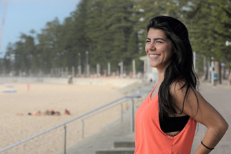 Student on beach happy