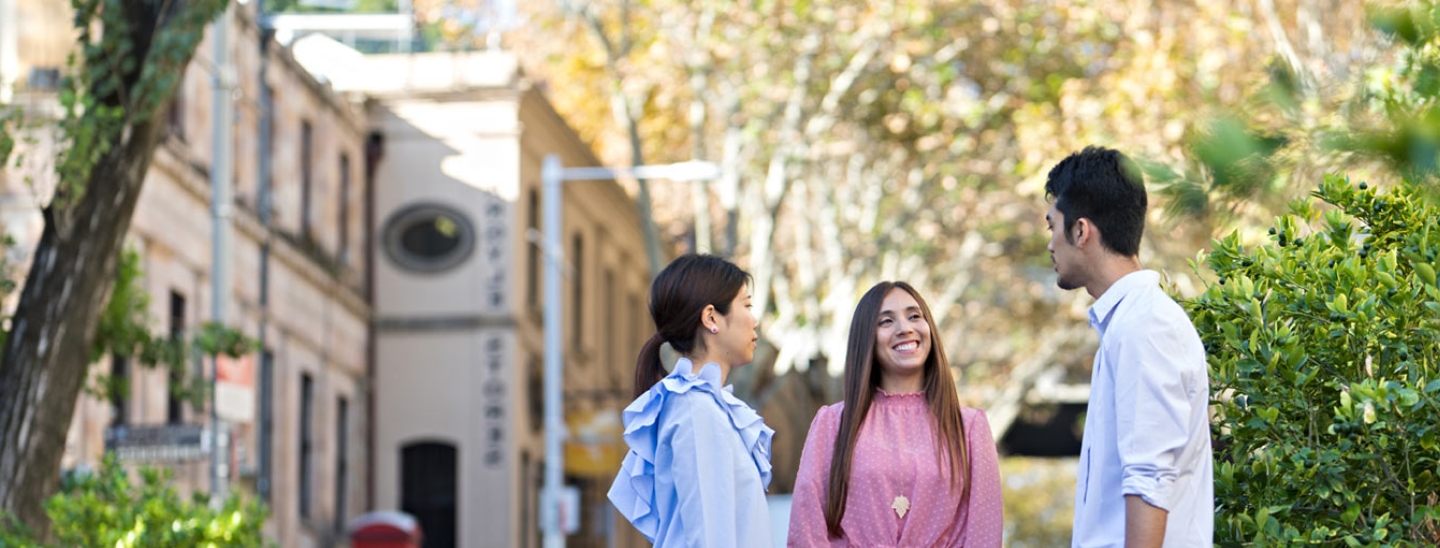 Student outside talking