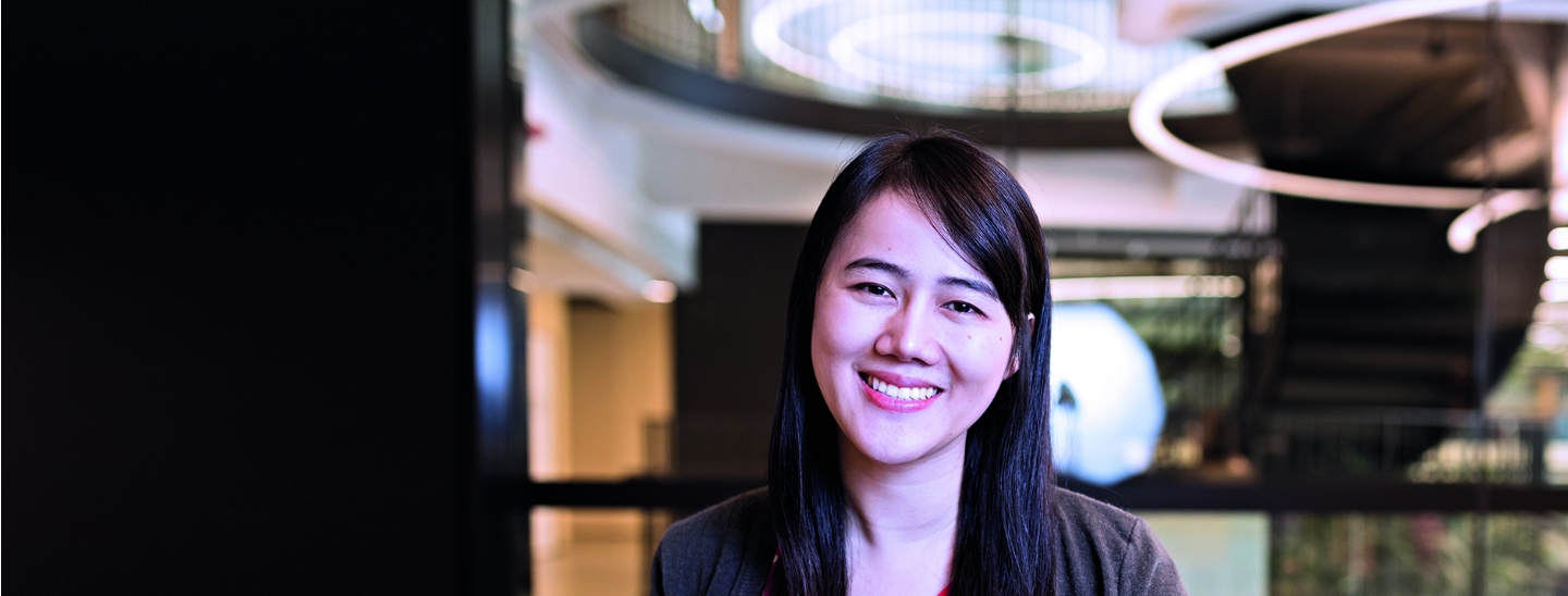 Student woman smiling inside