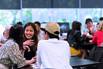 Students inside socialising