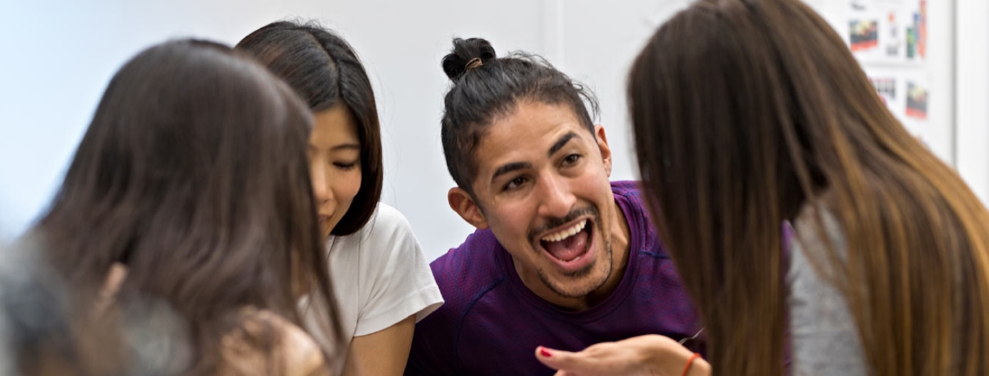 Students on campus happy together working