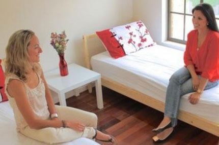 Two students sitting in room